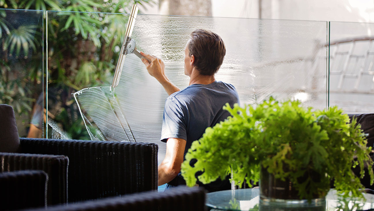Man cleaning window service-1